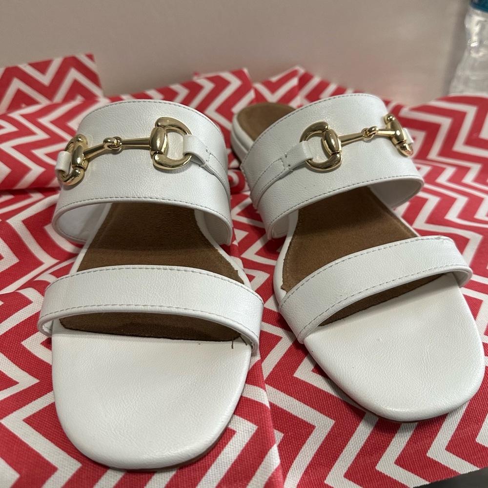 AEROSOLES  size 8. White sandal with gold decorations.  Like new